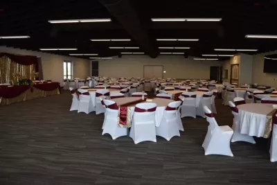 Set tables and covered chairs