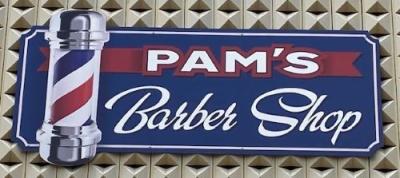 Pam's Barber shop sign with bright blue background
